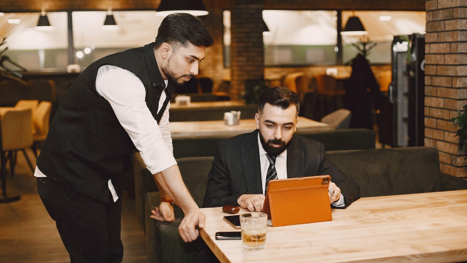 Man talking to his new manager about his schedule