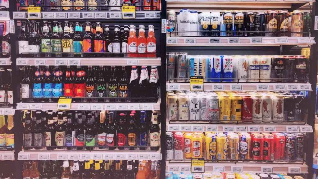 Cooler stocked with single bottles of alcohol