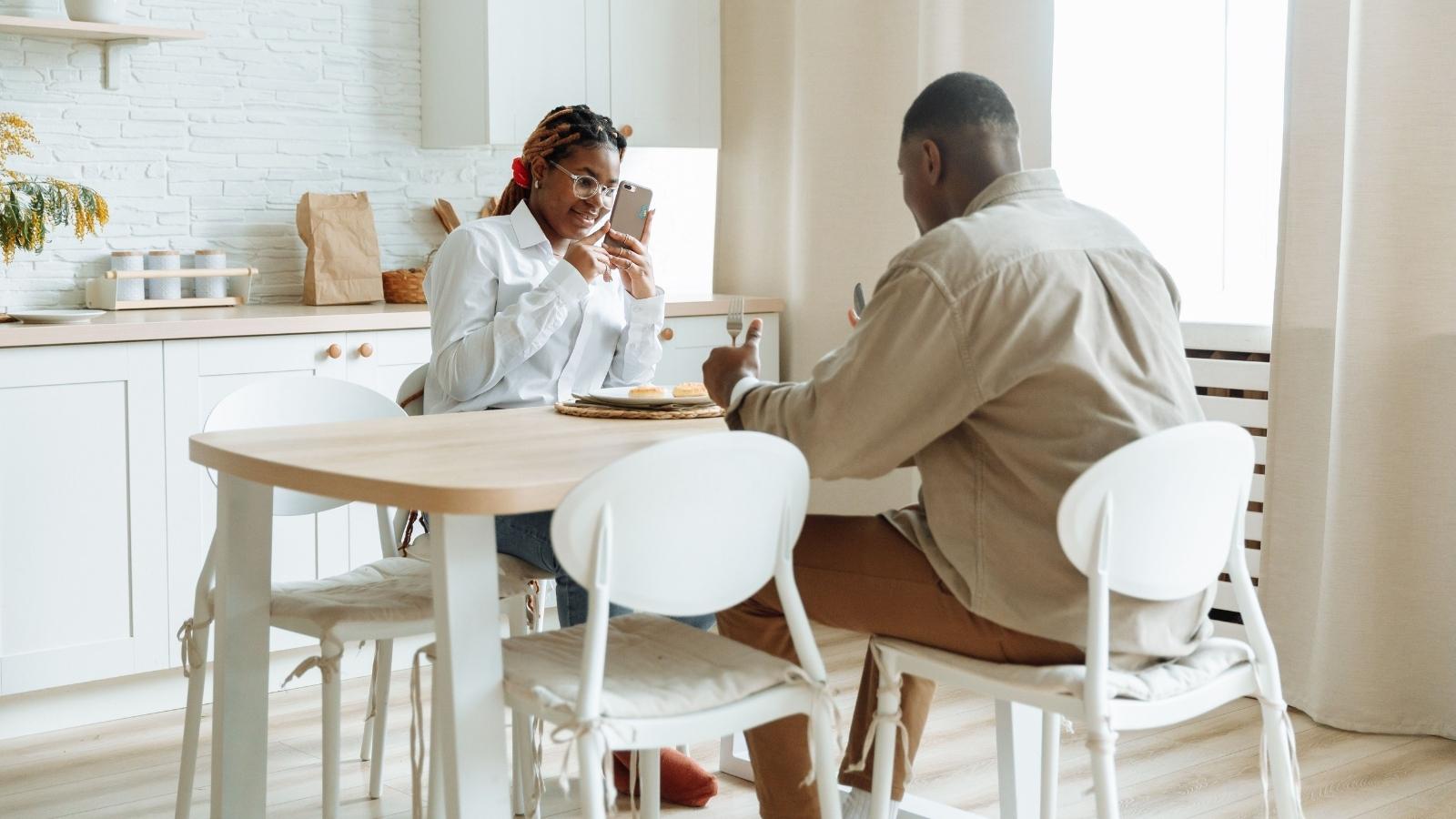Couple eating at the dining table 