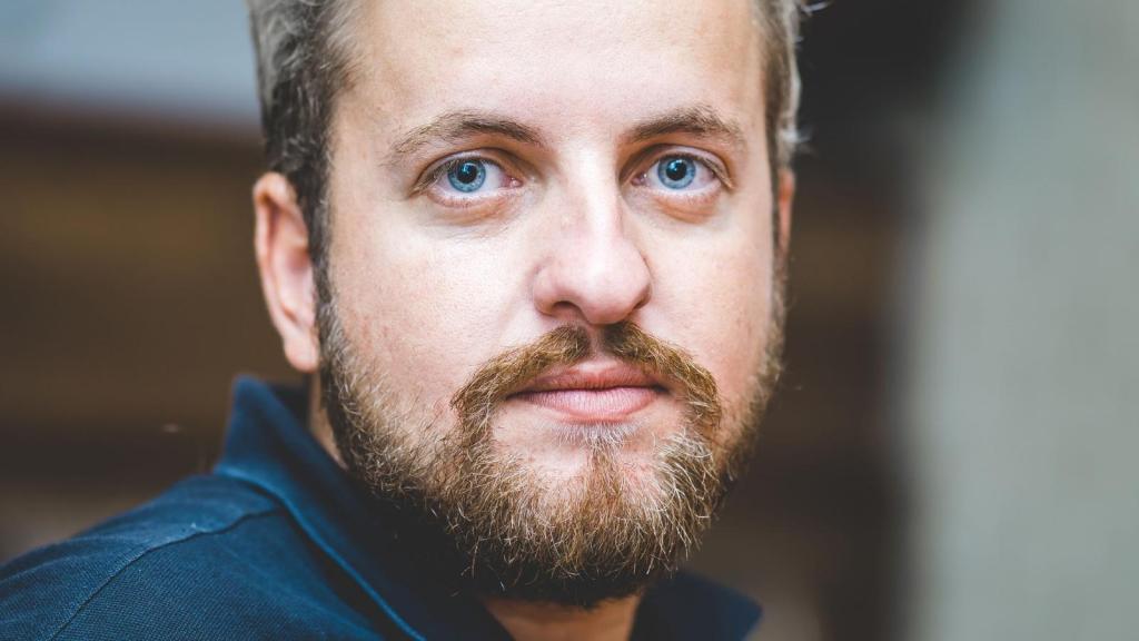 Man looking at a customer he just helped at another place