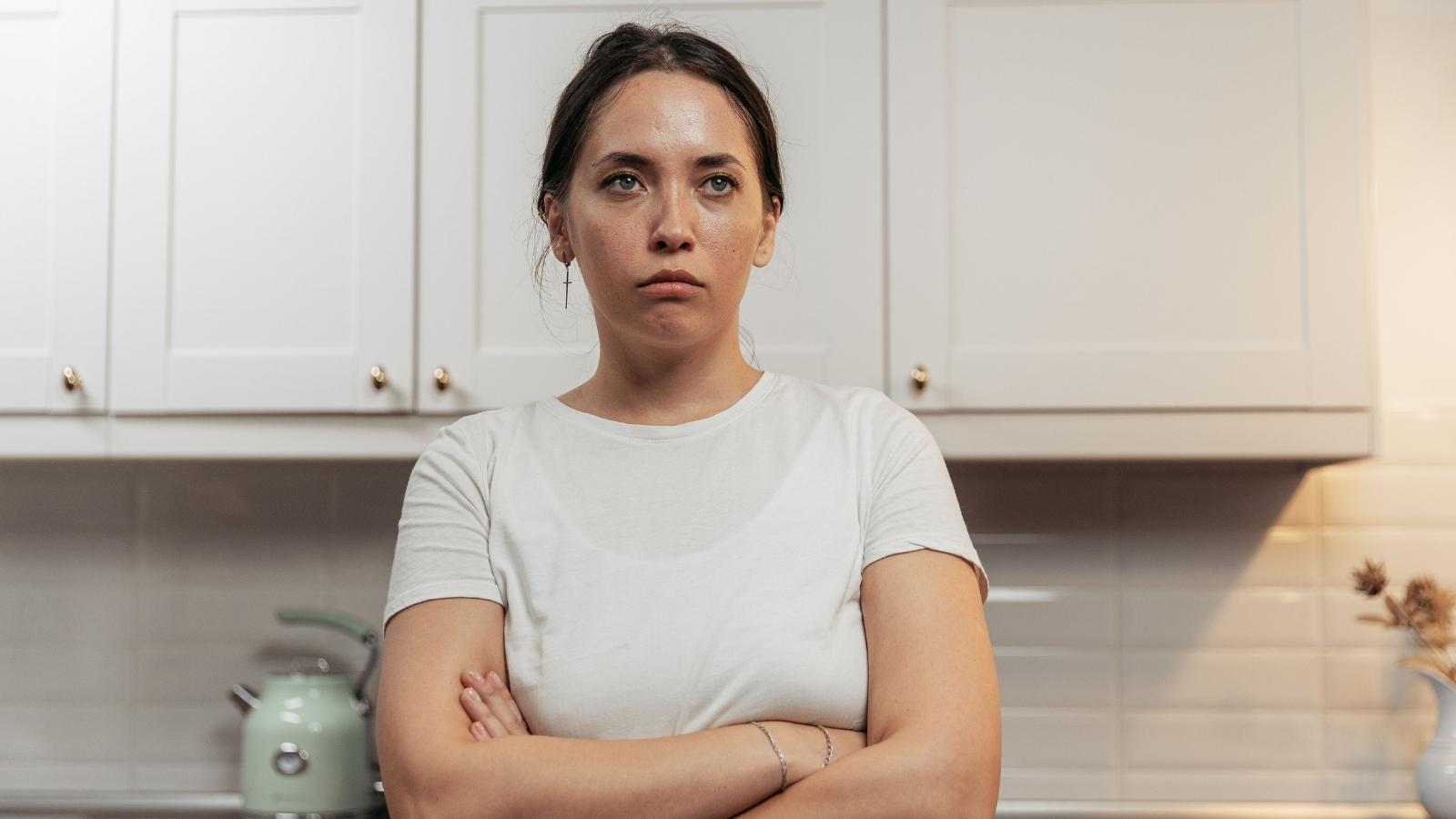 Woman thinking about a stressful situation