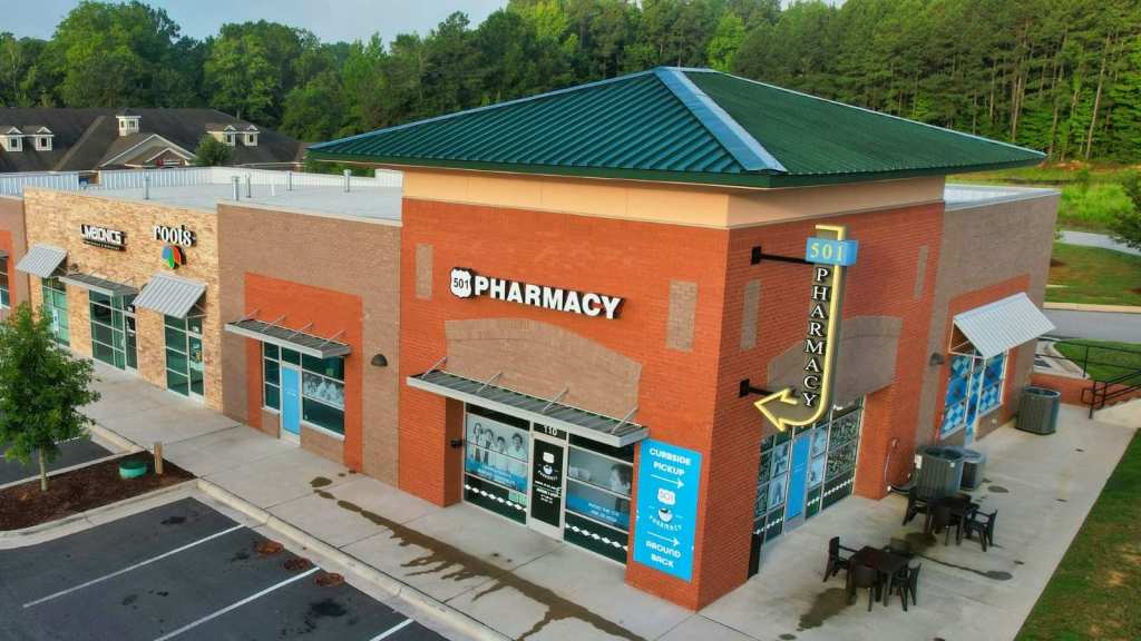 Aerial shot of an orange pharmacy building