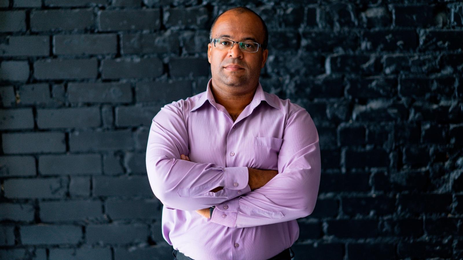 Man looking upset with his arms crossed