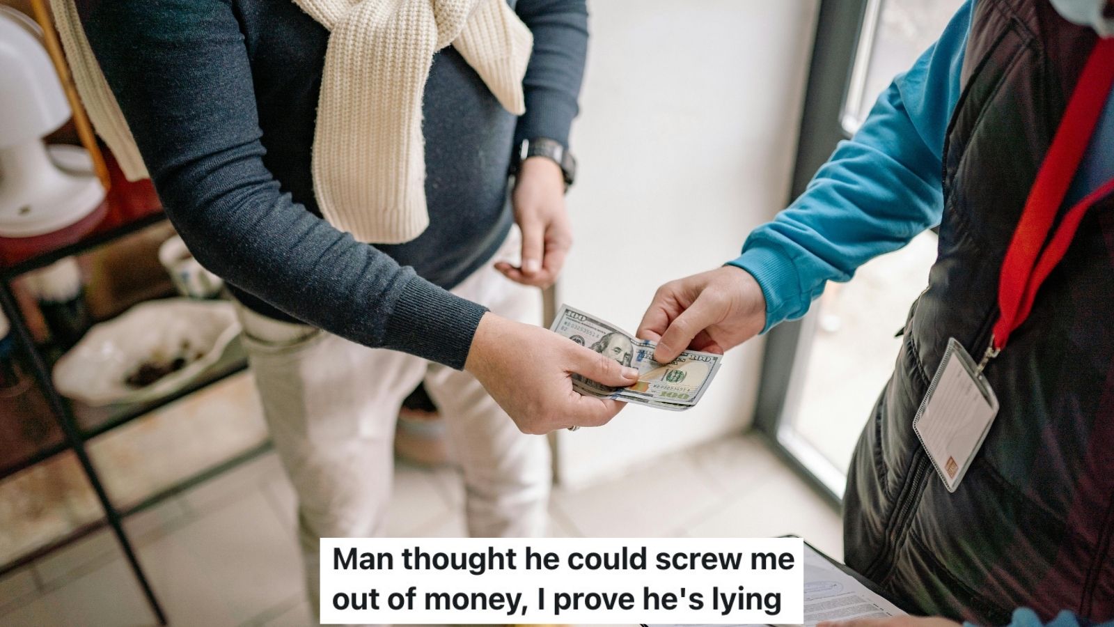 man paying with cash