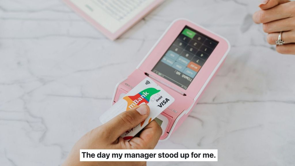 woman paying with wic card