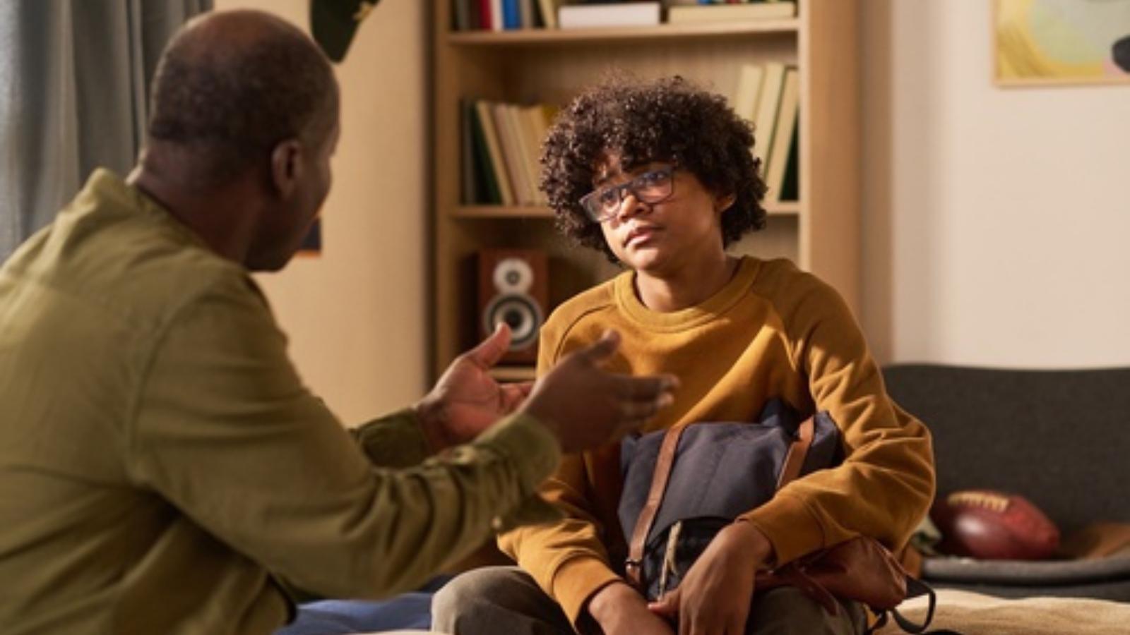 Dad talking to son