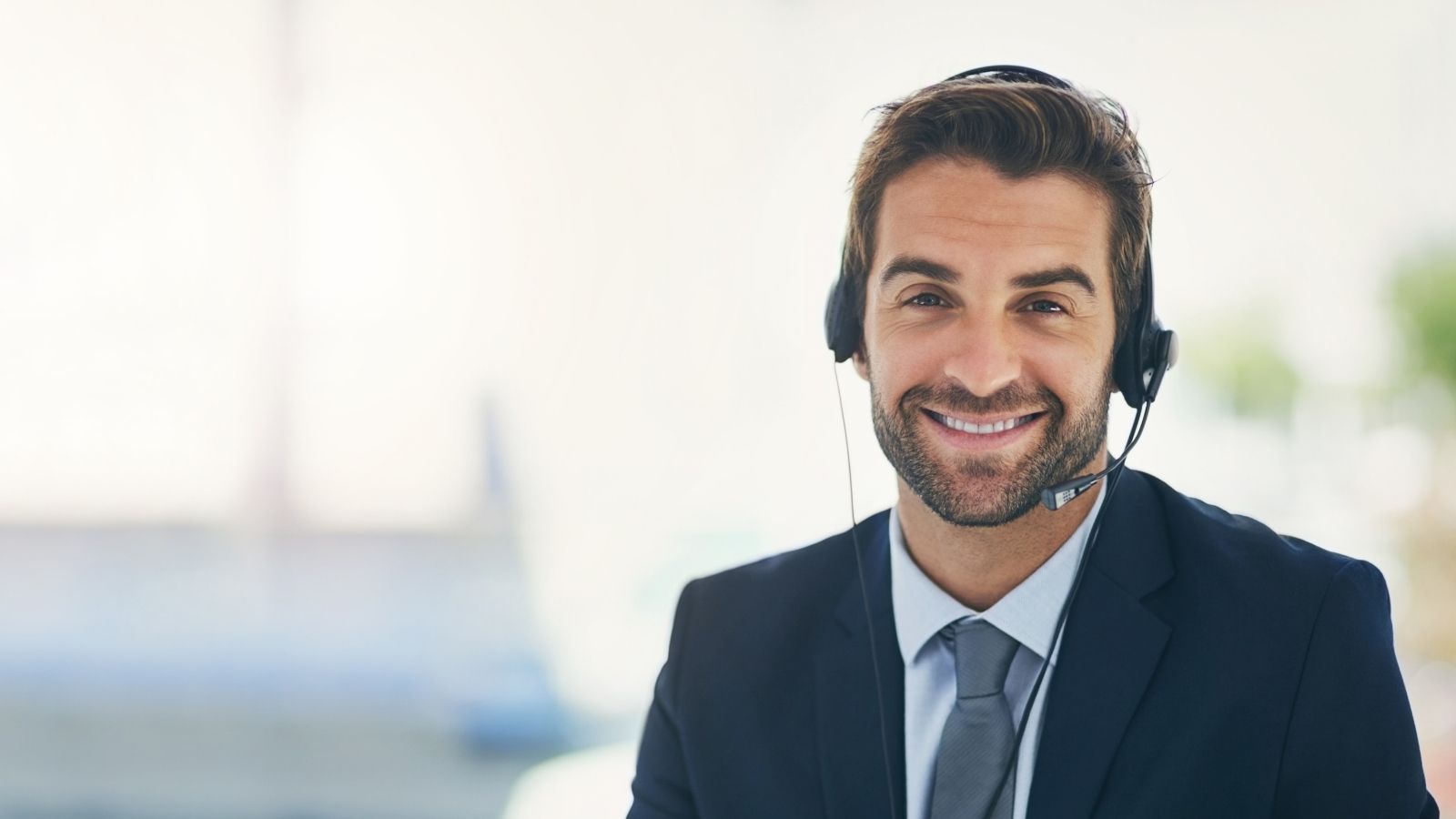 How a Vip Client’s Plan to Get a Helpline Worker Fired Backfired Into an Absolute Compliance Disaster businessman wearing a headset