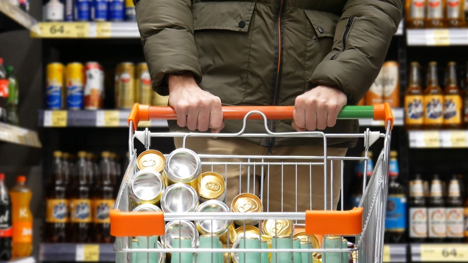 A Manager Refused to Sell Alcohol to an Intoxicated Customer. Then the Cashier Looked Closer and Realized It Was Her Own Stepdad. man pushing shopping cart full of cans of beer
