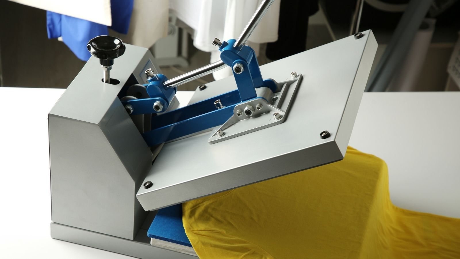 yellow t-shirt in a heat press