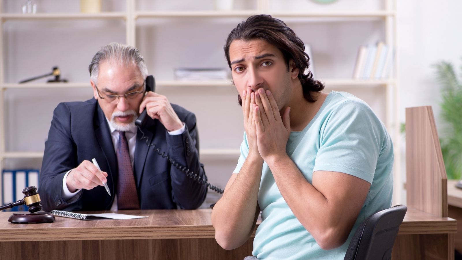 The Fine Letters Were Sent, then the Subpoenas Arrived. Inside the High Stakes Suburban Standoff Triggered by a Boards Extreme Overreach. worried young man talking to a lawyer