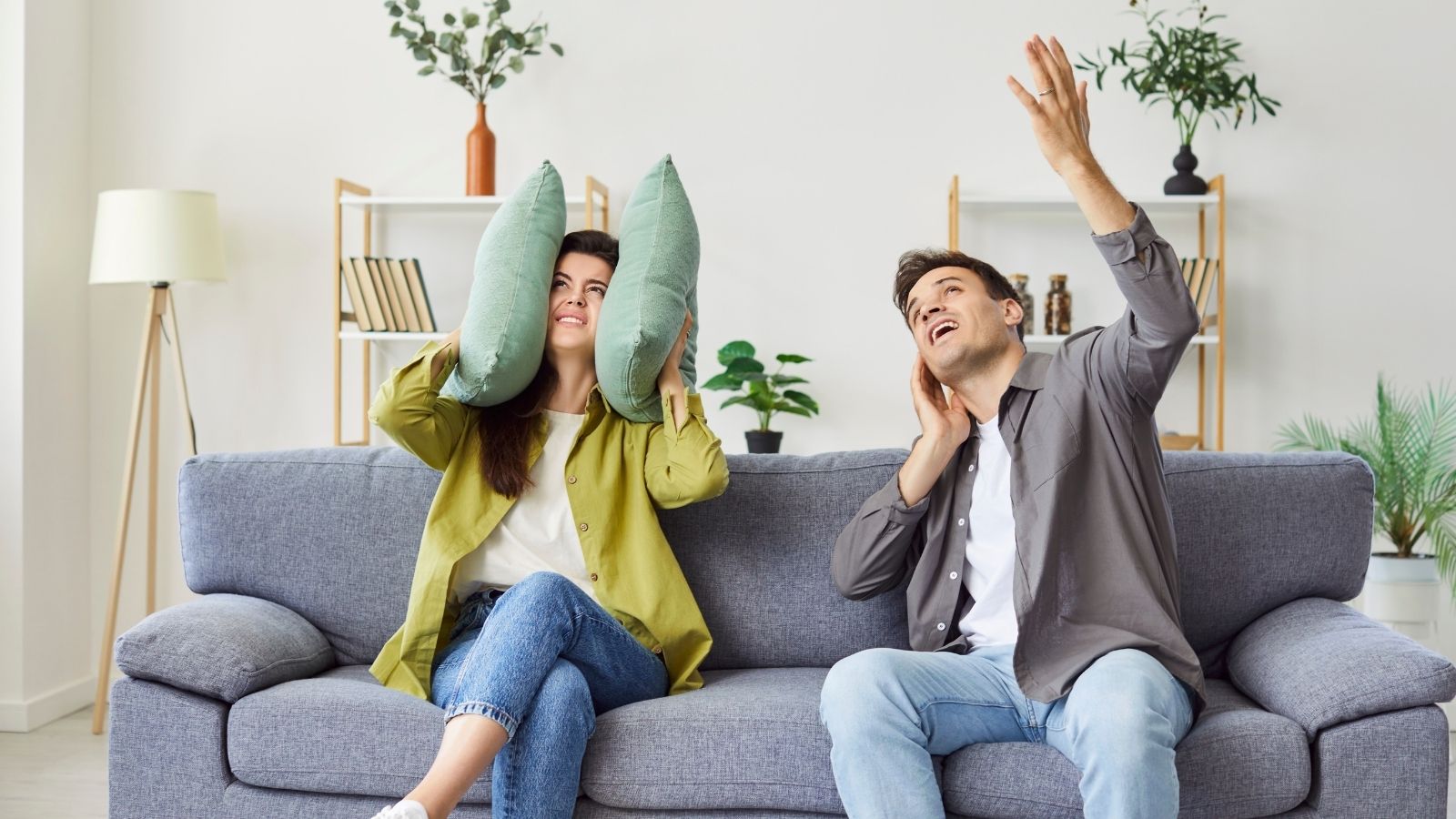couple annoyed with noisy upstairs neighbors