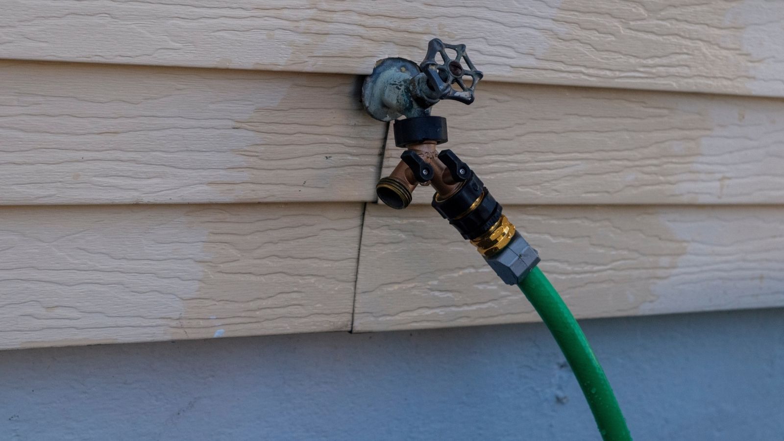 hose hooked up outside a house