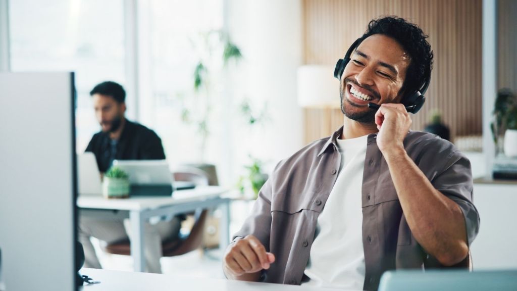 tech support call center worker laughing