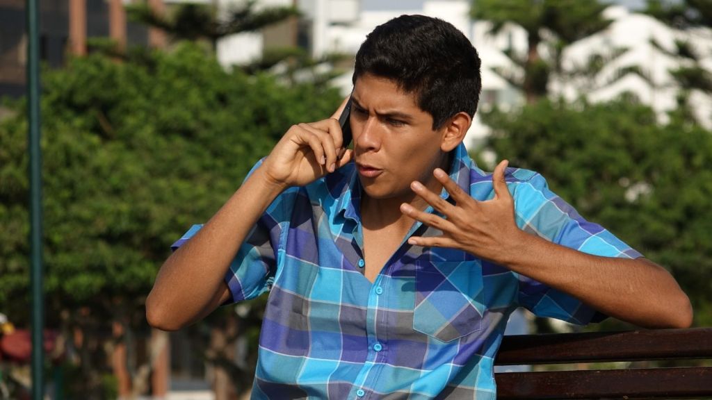 angry young man on a phone call
