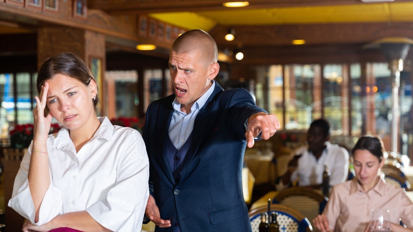 A Manager Tried to Use a New Waitress as the Punchline of a Joke. Her Dad Heard About It and Instantly Escalated It to Corporate. man yelling at waitress in restaurant