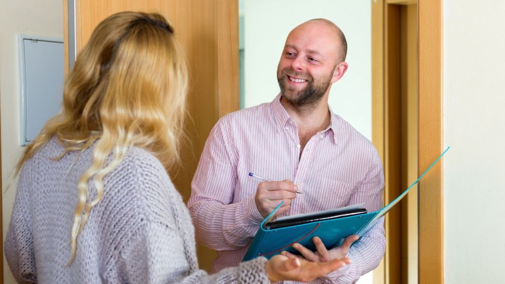 salesman talking to woman