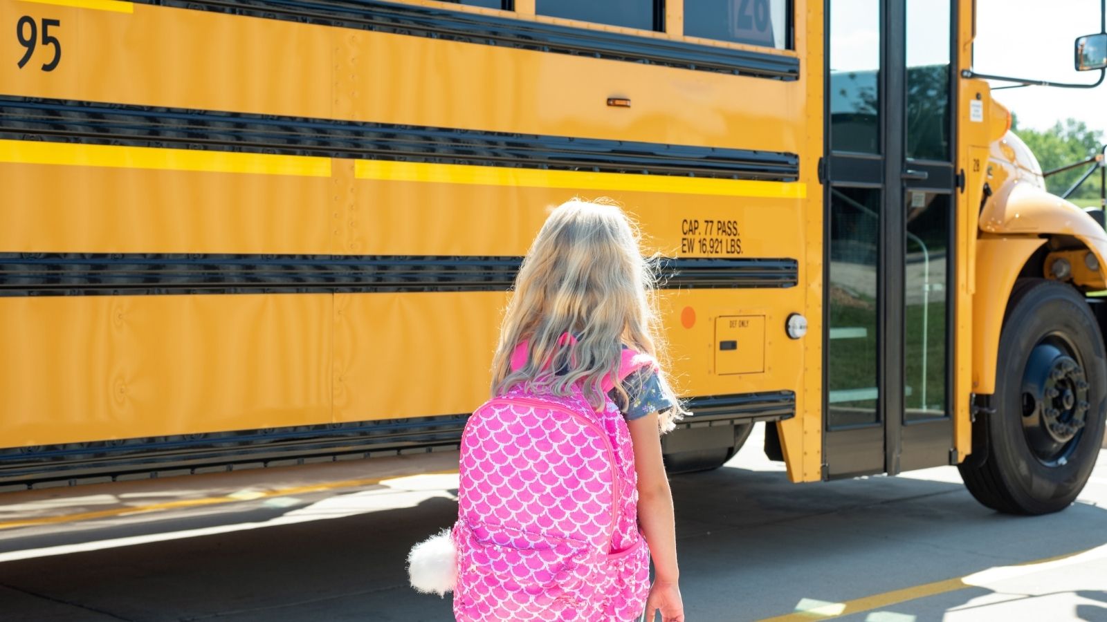 Childcare Employees Frustrated After Management Change Leads to Repeated Missed School Bus little girl walking towards schoolbus
