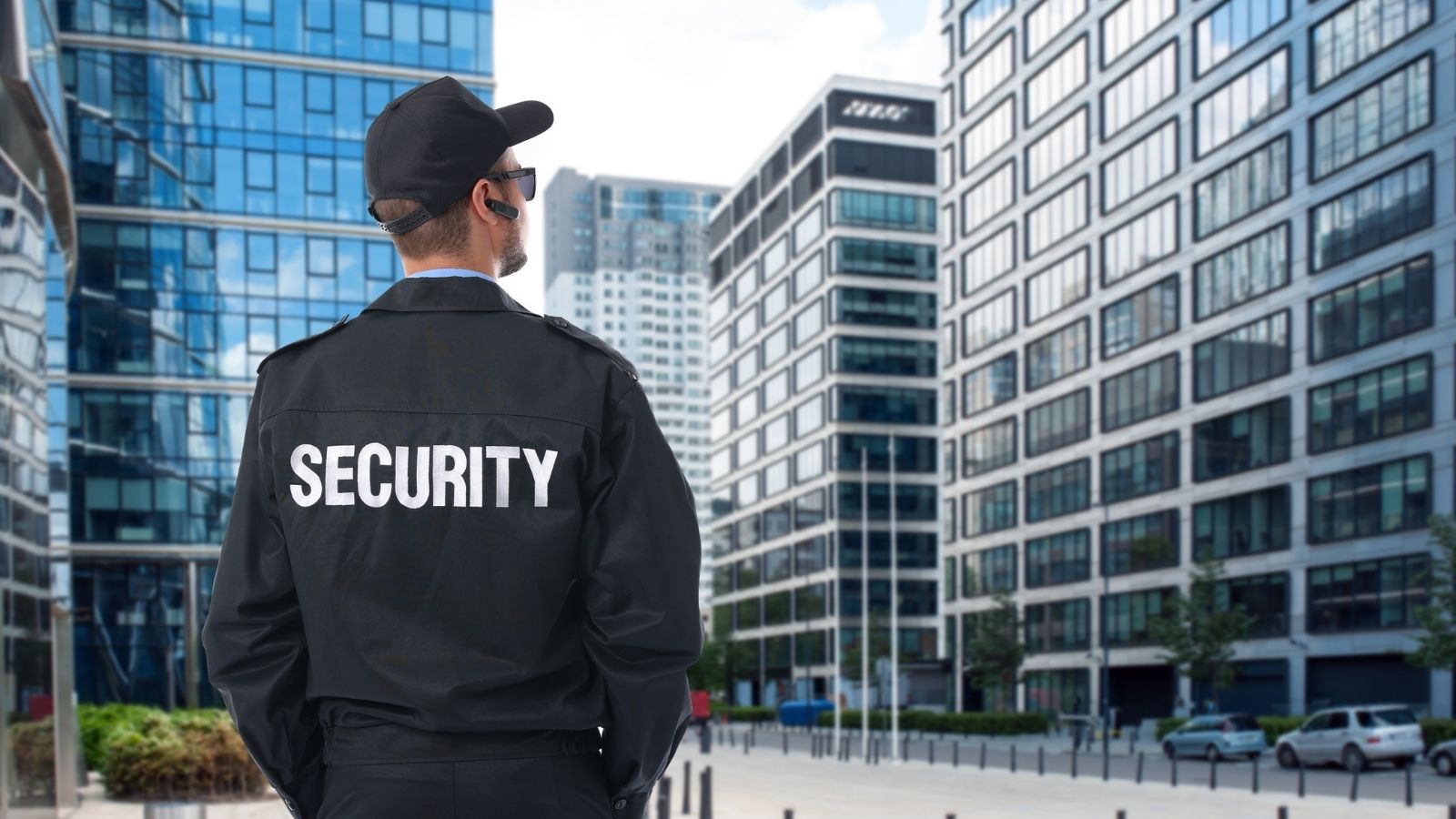 He Doesnt Understand His Supervisors Staffing Decisions — His Supervisor Has No Interest in Explaining Them security guard looking at tall buildings