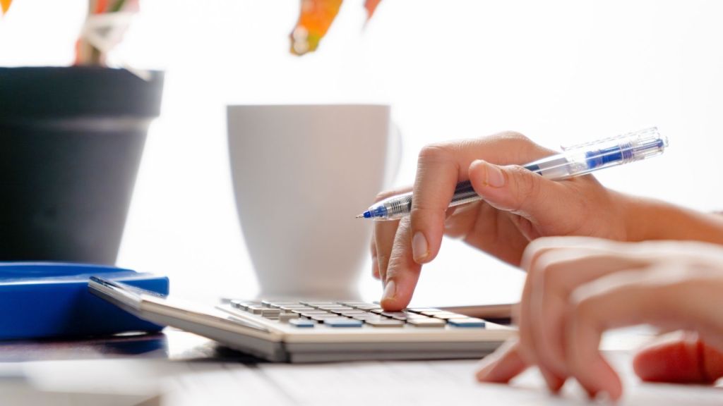 woman using a calculator