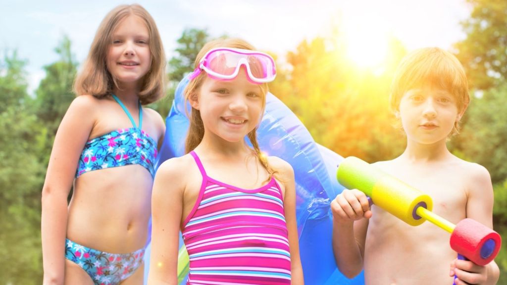 three kids ready for the pool