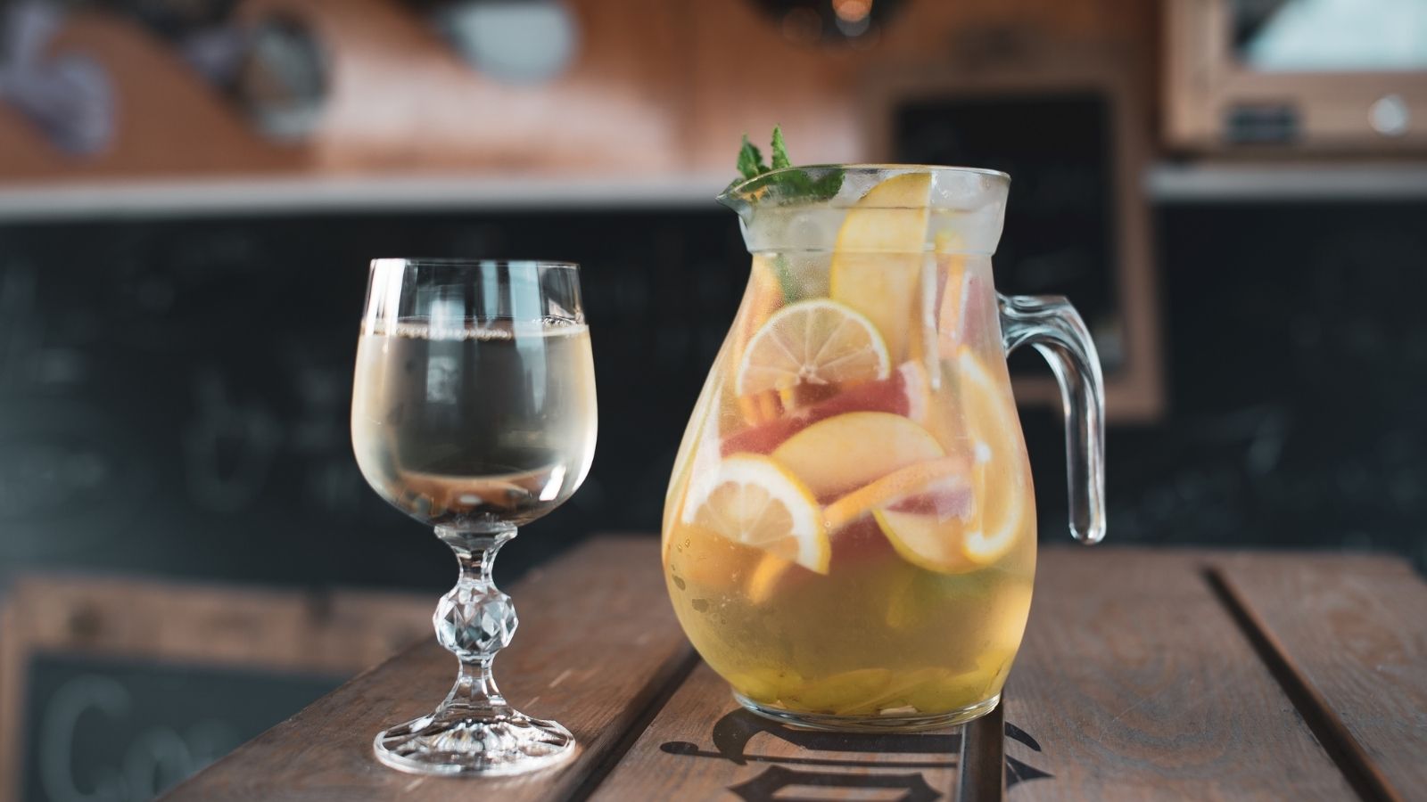 pitcher and glass of sangria at a restaurant