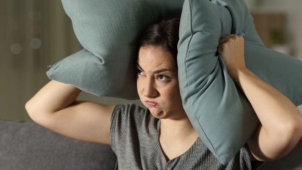 woman upset at noisy neighbors