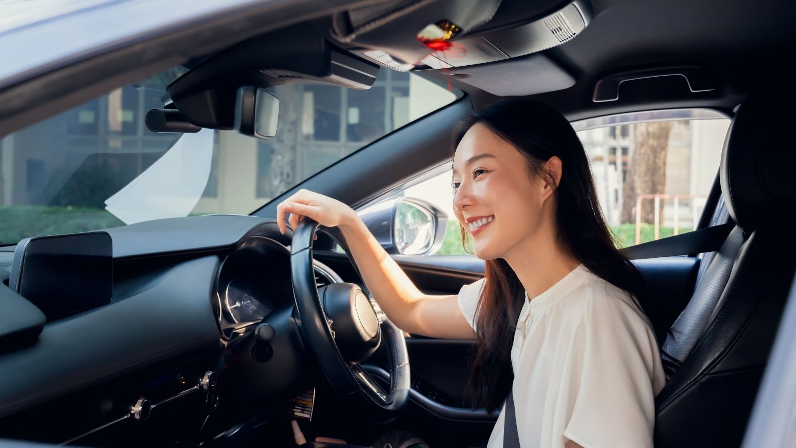 Workplace Dilemma: Man Debates Reporting His Friend’s Wife For Allegedly Driving Illegally smiling woman driving a car