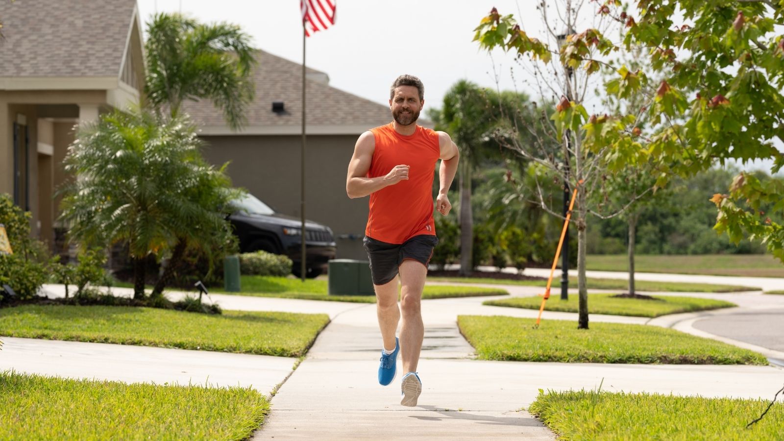 An Unpermitted Yard Paving Created a Running Hazard Until a Nearby Resident Reported It to the City man running on neighborhood sidewalk