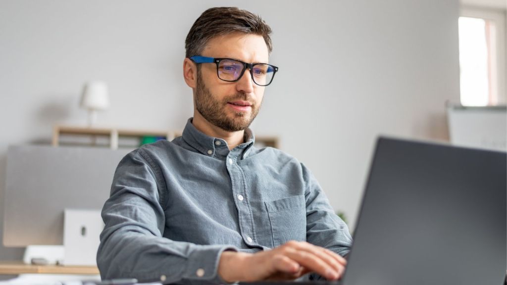 businessman looking at his computer