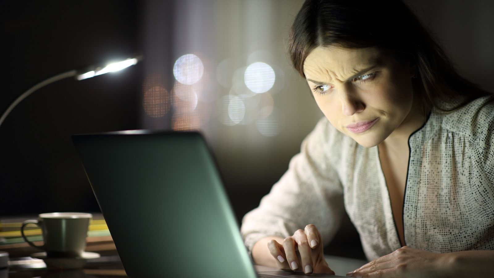 He Tried to Quit Professionally. His Boss Responded by Terminating Him on the Spot and Calling Security. woman looking at her computer