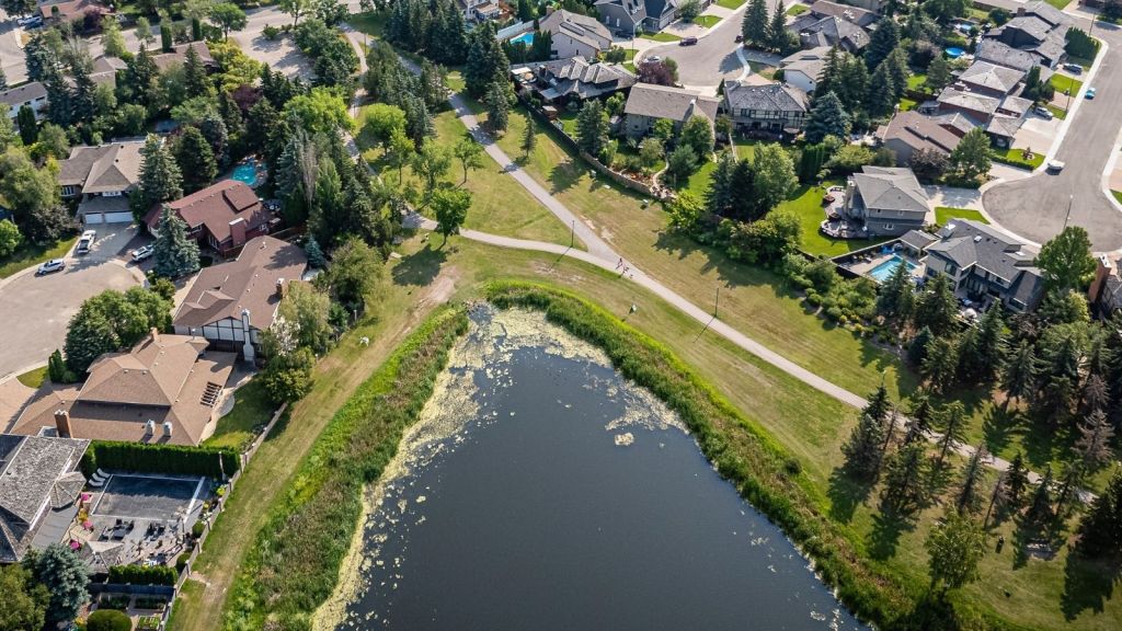 Residential area with houses and a pond