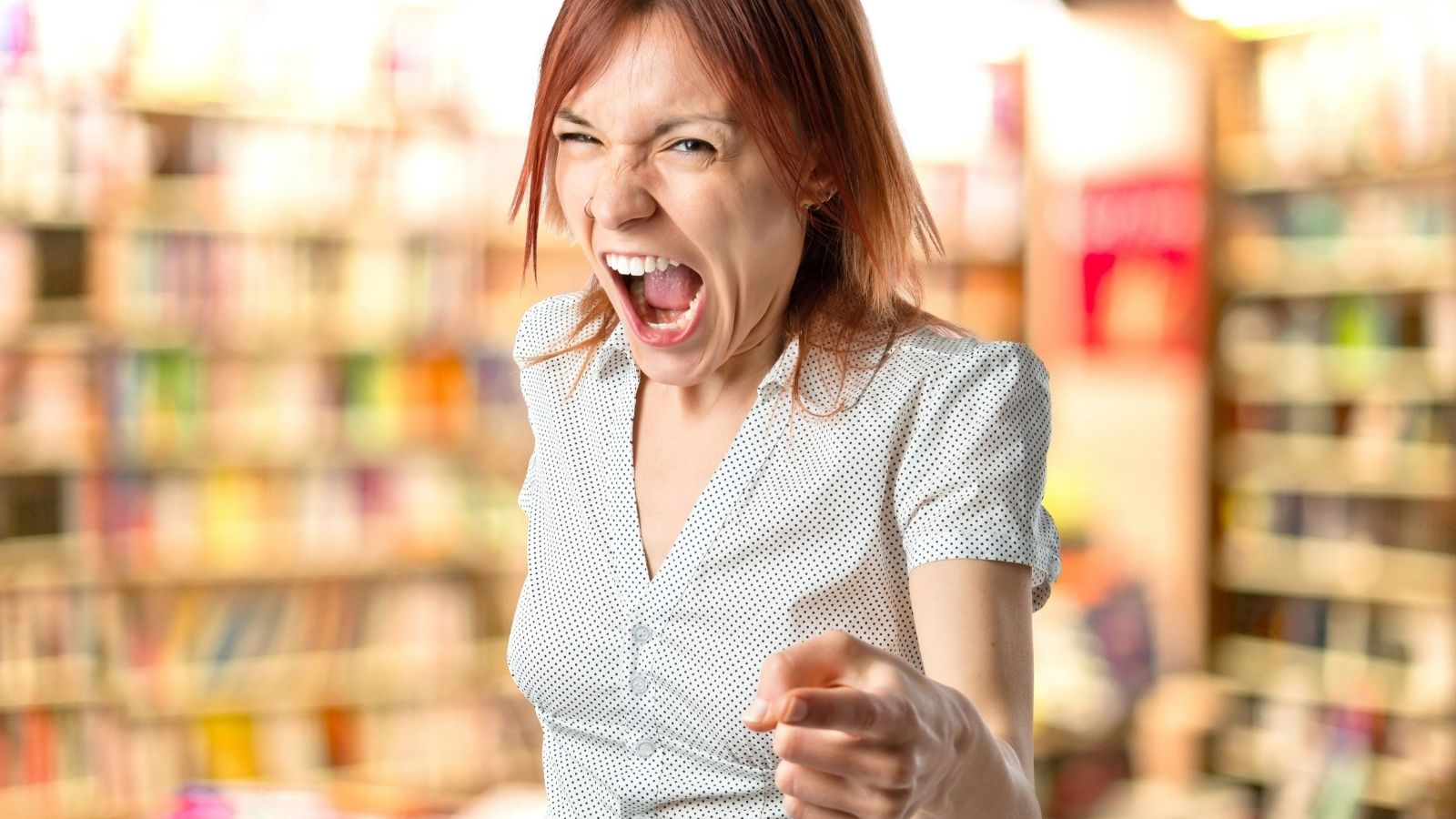 Mom Wants a Refund After Objecting to Manga Content, but the Store’s Policy Gets in the Way angry woman yelling and pointing at bookstore