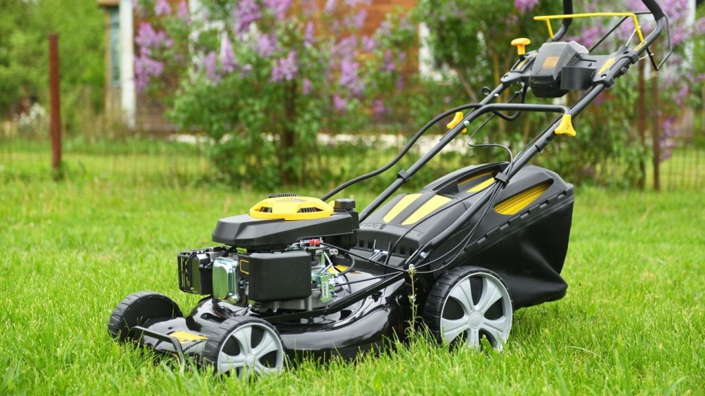 new lawn mower on green grass