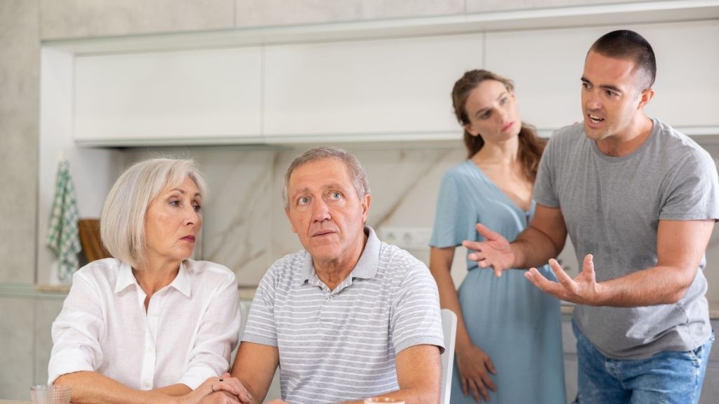 man arguing with his parents
