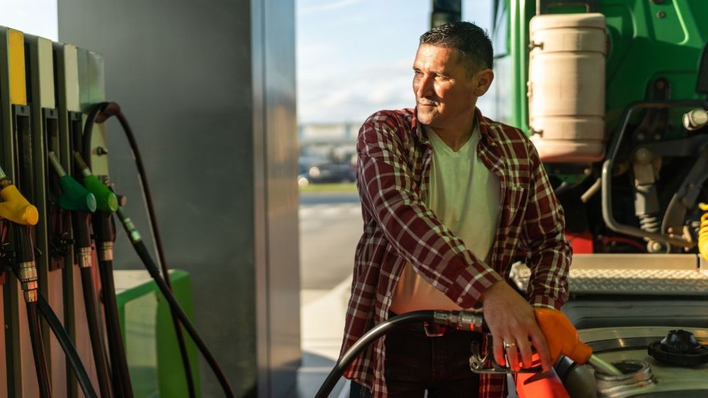 truck driver at a gas station
