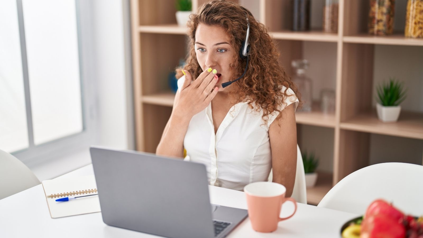 She Bragged About Sleeping on the Clock. Her Friend in Management Made Sure Her Supervisor Found Out. call center employee looking surprised