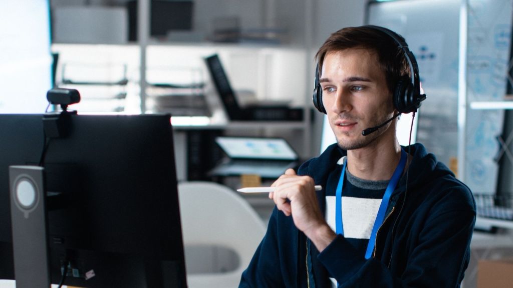 man working in a call center
