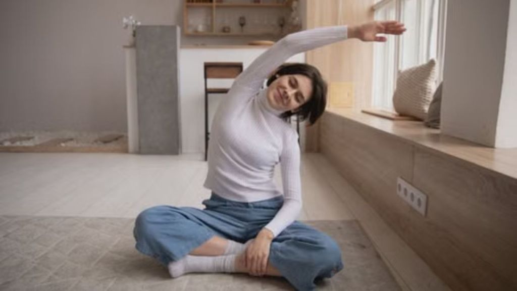 Woman doing a sitting exercise at home