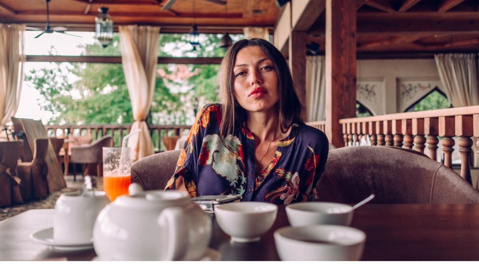 Employee Refused to Help a Customer After Racist Comments, but Her Manager Had Other Plans Woman eating in a restaurant