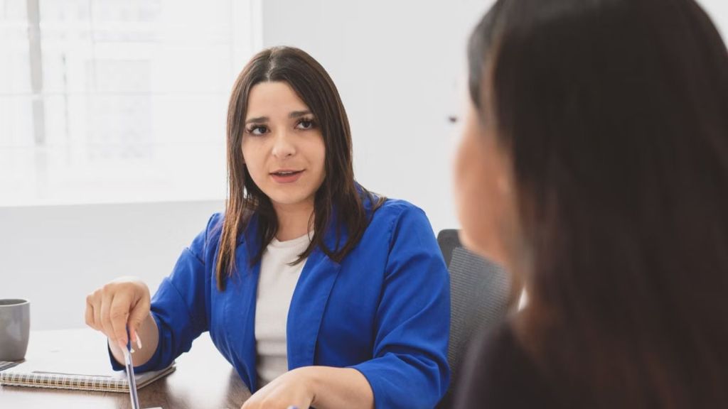 Boss talking to an employee about a serious matter