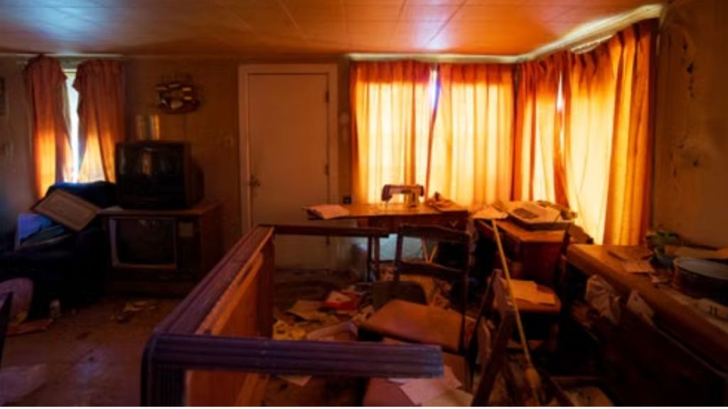 An old room with broken furniture and messy things