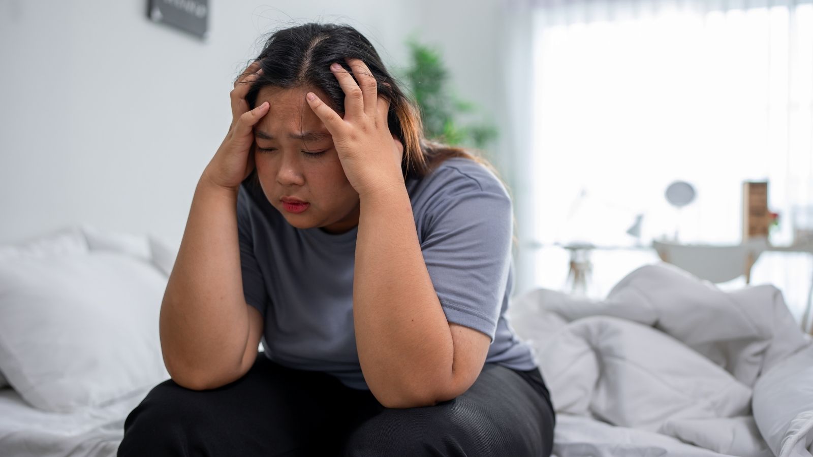 sad overweight woman
