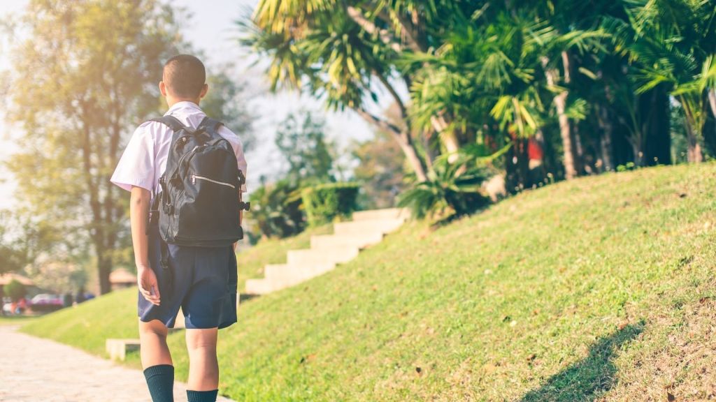 middle school student walking home