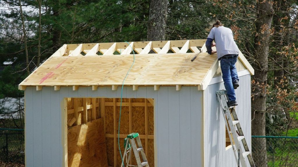 worker building a shed