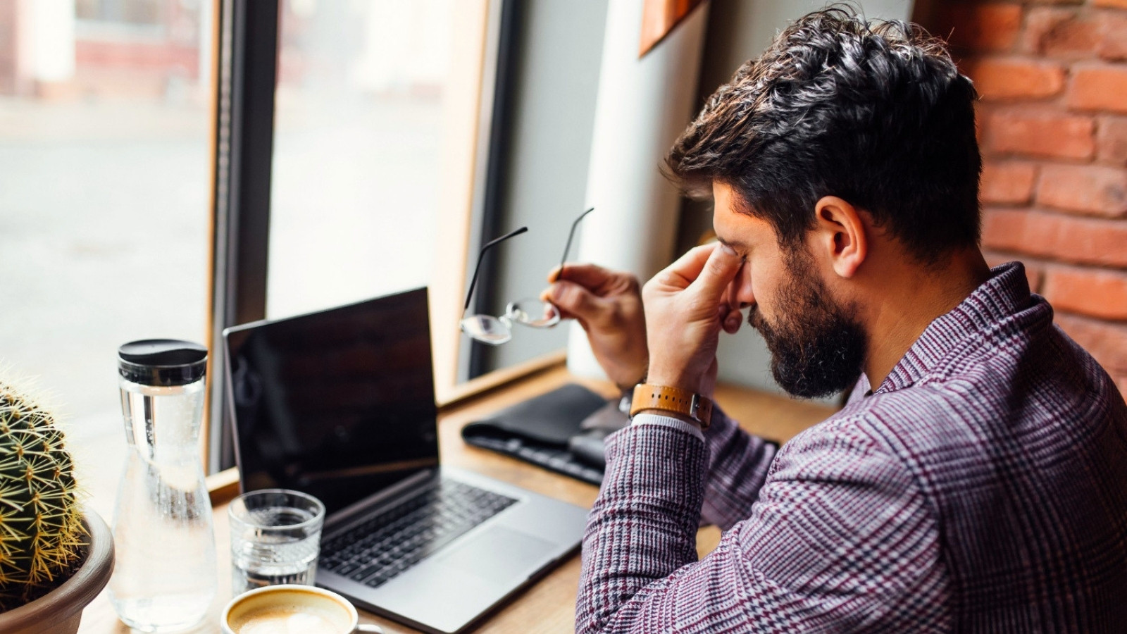 Stressed man working