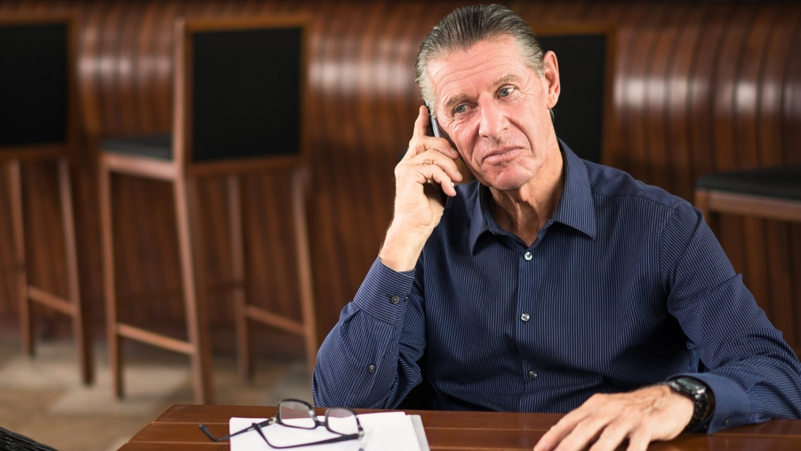 His 60 Year Old Coworker Complained About the Job Constantly And Then Quit. Now He Wants to Come Back. Senior man talking on the phone