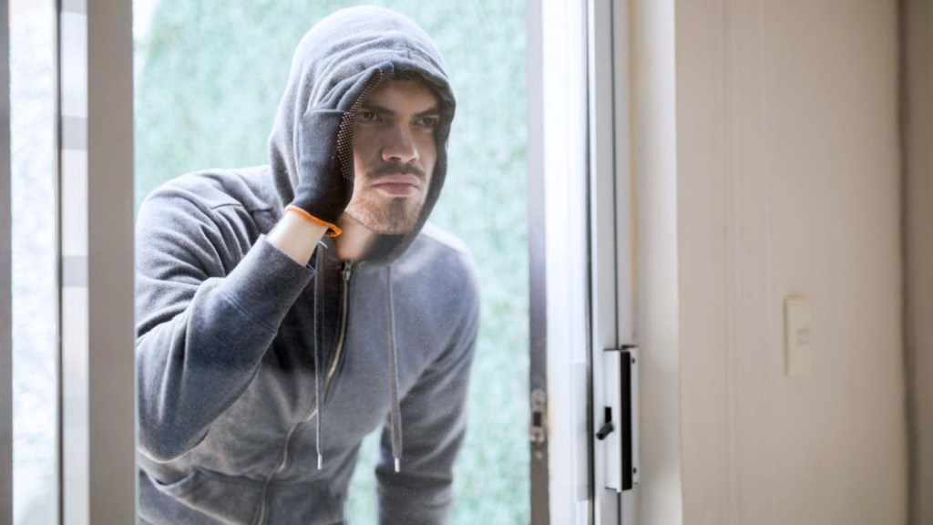 Male robber wearing a hoodie