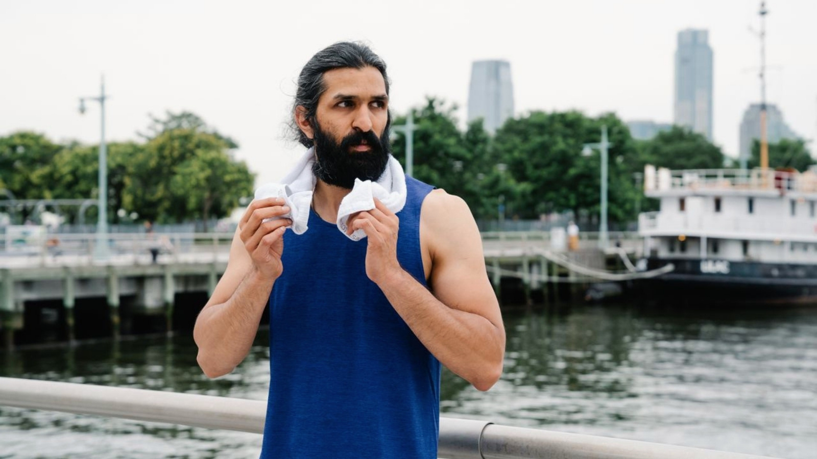 He Insists on Using Hand Towels After Showering, But His Wife Says His Lifestyle Choice Is Destroying the Laundry Man using hand towel outside