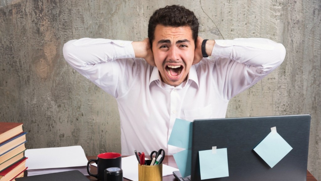 Man freaking out at work