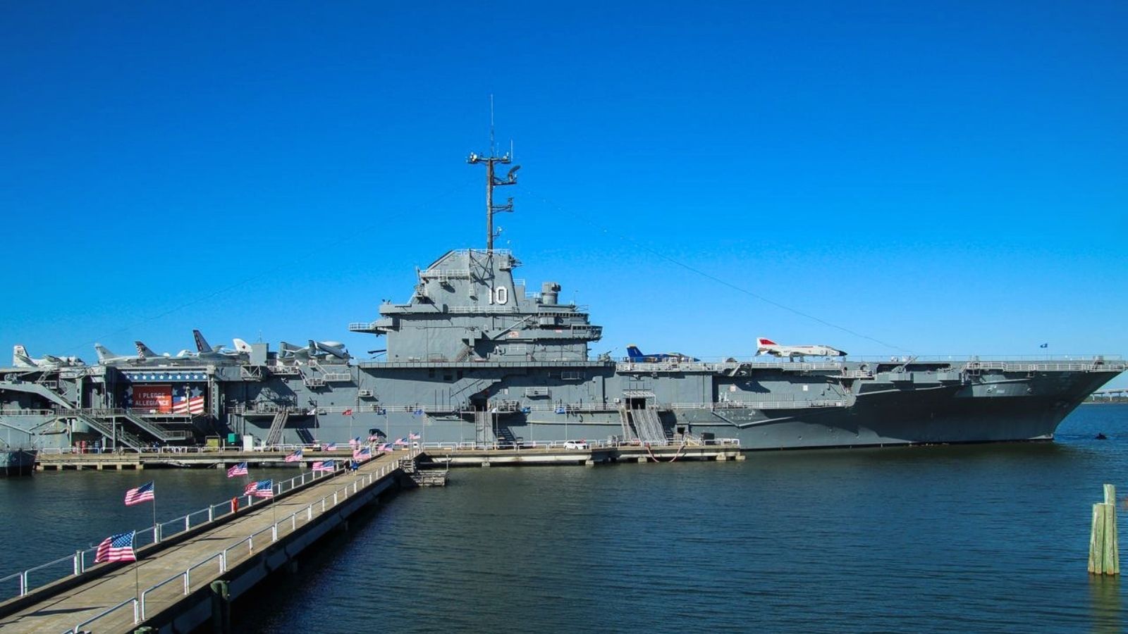 He Was Just Visiting a Museum With His Girlfriend—Until People Realized He Actually Served on the Ship USS Yorktown against blue sky